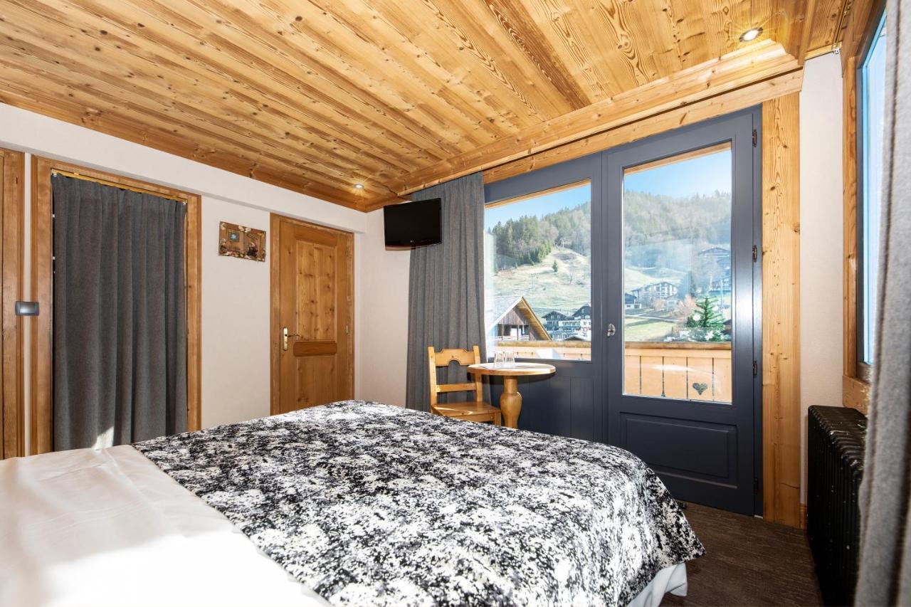Hotel-Chalet Les Ecureuils Restaurant, Piscine, Garage Le Grand-Bornand Exterior photo